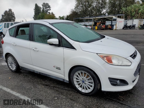 2015 Ford C-Max Energi SEL with VIN 1FADP5CU8FL101583, listed as a Copart auction lot 82705453 with 135,492 mi miles. Bid and sale history available at carsss.com. Image 4.