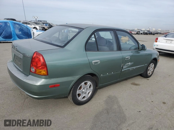 2004 Hyundai Accent GL with VIN KMHCG45C14U540938, listed as a Copart auction lot 46701935 with 71,891 mi miles and Salvage Title. Bid and sale history available at carsss.com. Image 3.