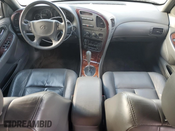 2001 Oldsmobile Aurora with VIN 1G3GR62H714104411, listed as a Copart auction lot 82601984 with 135,486 mi miles and Salvage Title. Bid and sale history available at DreamBid. Image 8.