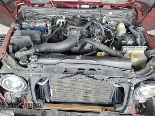 2007 Jeep Wrangler Unlimited Sahara с VIN 1J4GA591X7L198917, выставлен на аукционе Copart как лот 53311565 с пробегом 244 368 миль миль и Списание • Salvage title. История ставок и продаж доступна на DreamBid. Изображение 12.