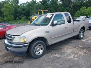 1998 Ford F-150 with VIN 1FTZX1760WNB21027, listed as a IAAI auction lot 42651506 with 189,442 mi miles and . Bid and sale history available at DreamBid. Image 2.