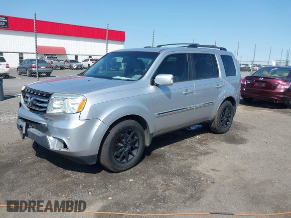 2013 Honda Pilot Touring with VIN 5FNYF3H95DB032438, listed as a IAAI auction lot 41865938 with 298,973 mi miles and . Bid and sale history available at DreamBid. Image 2.