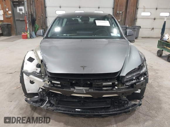 2024 Tesla Model 3 Long Range with VIN 5YJ3E1EB0RF860736, listed as a IAAI auction lot 41966827 with 5,134 mi miles and . Bid and sale history available at DreamBid. Image 13.