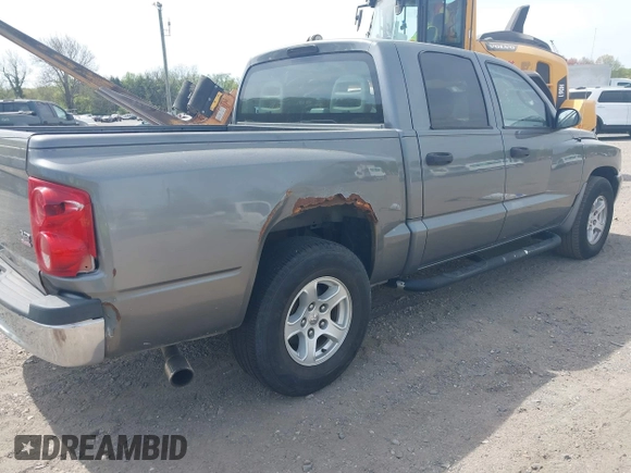 2006 Dodge Dakota SLT with VIN 1D7HE48N06S580705, listed as a IAAI auction lot 42120728 with 206,420 mi miles. Bid and sale history available at carsss.com. Image 4.