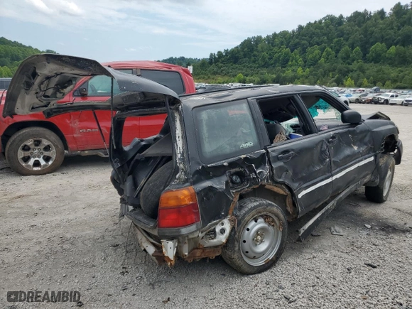 2000 Subaru Forester S with VIN JF1SF6555YH712800, listed as a Copart auction lot 60803414 with 0 mi miles and Salvage Title. Bid and sale history available at carsss.com. Image 3.