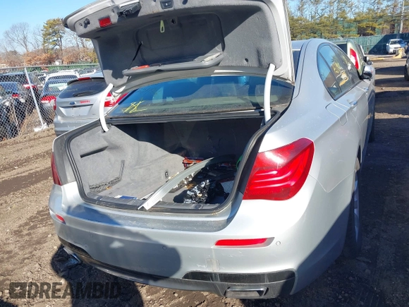 2014 BMW 7 Series 740i with VIN WBAYA6C54ED144450, listed as a IAAI auction lot 41680060 with 999,999 mi miles. Bid and sale history available at carsss.com. Image 15.