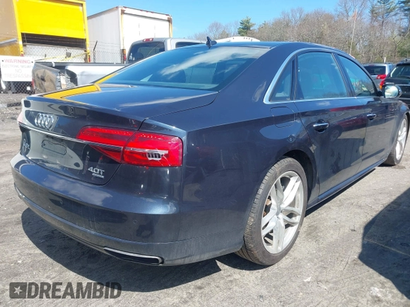 2016 Audi A8 L 4.0T Sport with VIN WAU43AFD1GN022253, listed as a IAAI auction lot 41858053 with 219,517 mi miles. Bid and sale history available at carsss.com. Image 4.