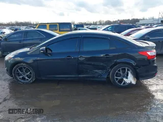 2013 Ford Focus SE z VIN 1FADP3F27DL342384, wystawiony jako IAAI lot #41474290 z przebiegiem 125 664 mil mil oraz . Historia ofert i sprzedaży dostępna na DreamBid. Obrazek 15.