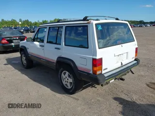 1994 Jeep Cherokee Sport with VIN 1J4FT68S7RL160652, listed as a IAAI auction lot 41992392 with 158,122 mi miles and . Bid and sale history available at DreamBid. Image 3.