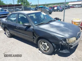 1997 Geo Prizm LSi z VIN 1Y1SK5267VZ447232, wystawiony jako IAAI lot #42289597 z przebiegiem 100 974 mil mil oraz . Historia ofert i sprzedaży dostępna na DreamBid. Obrazek 1.