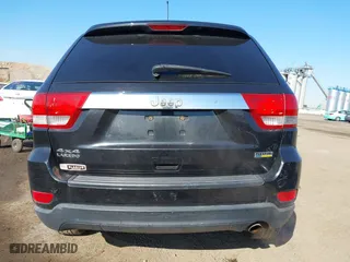 2012 Jeep Grand Cherokee Laredo with VIN 1C4RJFAG5CC118826, listed as a IAAI auction lot 42039801 with 158,153 mi miles. Bid and sale history available at carsss.com. Image 16.