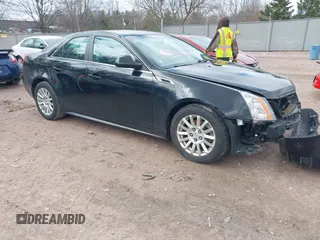 2011 Cadillac CTS Luxury with VIN 1G6DG5EY5B0161782, listed as a IAAI auction lot 42072757 with 127,540 mi miles and . Bid and sale history available at DreamBid. Image 1.