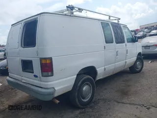 1993 Ford Econoline Cargo with VIN 1FTJE34H2PHA67802, listed as a IAAI auction lot 42127936 with 263,379 mi miles and . Bid and sale history available at DreamBid. Image 4.