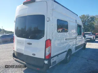 2022 Ford Transit Cargo with VIN 1FTBW3U85NKA01097, listed as a IAAI auction lot 41076643 with 24,786 mi miles and . Bid and sale history available at DreamBid. Image 4.