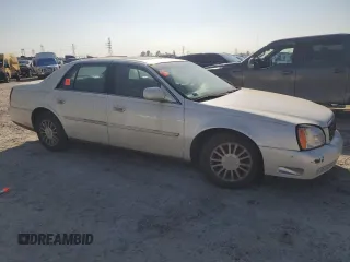 2003 Cadillac DeVille DHS z VIN 1G6KE57Y03U116432, wystawiony jako Copart lot #85949594 z przebiegiem 204 321 mil mil oraz Czysty tytuł • Clean title. Historia ofert i sprzedaży dostępna na DreamBid. Obrazek 4.