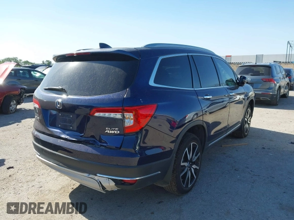 2020 Honda Pilot Elite with VIN 5FNYF6H02LB054348, listed as a IAAI auction lot 42302525 with 43,916 mi miles and . Bid and sale history available at DreamBid. Image 4.