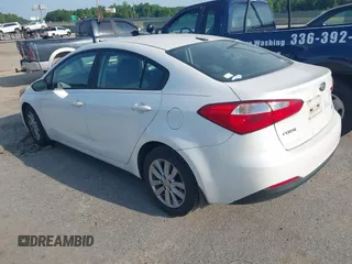 2014 Kia Forte LX with VIN KNAFX4A65E5204073, listed as a IAAI auction lot 42155914 with 167,079 mi miles and . Bid and sale history available at carsss.com. Image 3.