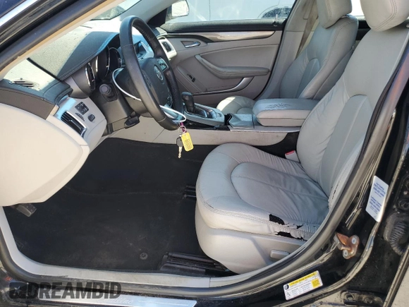 2010 Cadillac CTS with VIN 1G6DA5EG4A0134211, listed as a Copart auction lot 50063475 with 126,841 mi miles and Salvage Title. Bid and sale history available at DreamBid. Image 7.