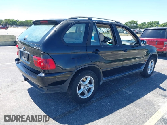 2002 BMW X5 3.0i with VIN 5UXFA53502LV70219, listed as a IAAI auction lot 41825148 with 0 mi miles. Bid and sale history available at carsss.com. Image 4.