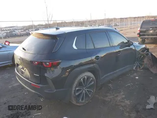 2024 Mazda CX-50 S Premium Plus z VIN 7MMVABEM5RN209065, wystawiony jako IAAI lot #41525183 z przebiegiem 12 297 mil mil oraz . Historia ofert i sprzedaży dostępna na DreamBid. Obrazek 4.