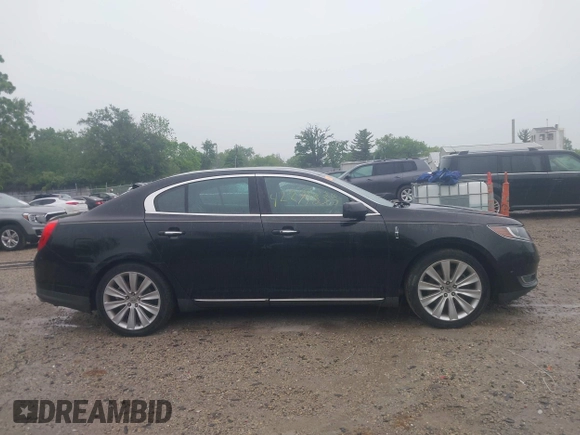 2013 Lincoln MKS EcoBoost with VIN 1LNHL9FT4DG607785, listed as a IAAI auction lot 42279833 with 126,548 mi miles and . Bid and sale history available at DreamBid. Image 13.
