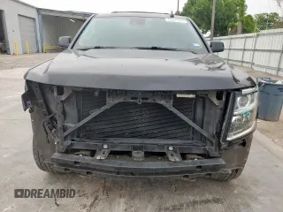 2020 Chevrolet Tahoe LT with VIN 1GNSCBKC5LR203301, listed as a Copart auction lot 57071315 with 106,376 mi miles and Salvage title. Bid and sale history available at DreamBid. Image 5.