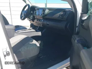 2022 Toyota Tacoma SR with VIN 3TYRX5GN5NT055120, listed as a IAAI auction lot 41687849 with 18,751 mi miles and . Bid and sale history available at DreamBid. Image 5.