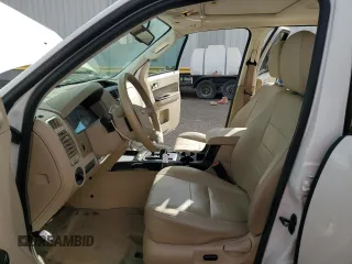 2010 Ford Escape Limited z VIN 1FMCU0EG8AKB93264, wystawiony jako Copart lot #48755805 z przebiegiem 69 141 mil mil oraz Szkoda całkowita • Salvage title. Historia ofert i sprzedaży dostępna na DreamBid. Obrazek 7.