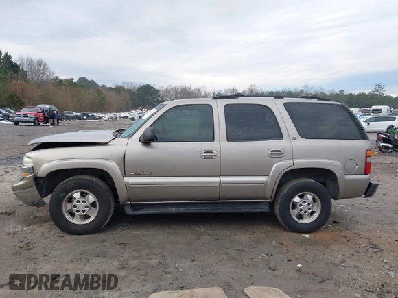 2002 Chevrolet Tahoe LT with VIN 1GNEC13Z22J256805, listed as a IAAI auction lot 41302460 with 249,578 mi miles and . Bid and sale history available at DreamBid. Image 14.