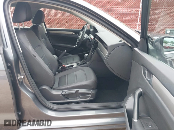 2021 Volkswagen Passat SE with VIN 1VWSA7A34MC019045, listed as a IAAI auction lot 42164157 with 78,436 mi miles and . Bid and sale history available at DreamBid. Image 5.