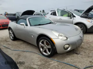 2009 Pontiac Solstice z VIN 1G2MN35B59Y107109, wystawiony jako Copart lot #76083734 z przebiegiem Nie podano mil oraz Nie do naprawy • Non repairable. Historia ofert i sprzedaży dostępna na DreamBid. Obrazek 4.