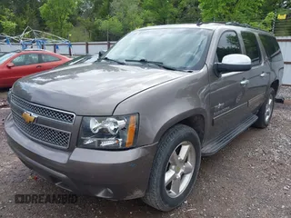 2011 Chevrolet Suburban LT with VIN 1GNSCJE03BR267184, listed as a IAAI auction lot 42156424 with 307,618 mi miles. Bid and sale history available at carsss.com. Image 17.