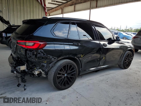 2022 BMW X5 xDrive40i with VIN 5UXCR6C0XN9M08766, listed as a Copart auction lot 51987215 with 30,997 mi miles and Salvage Title. Bid and sale history available at DreamBid. Image 3.