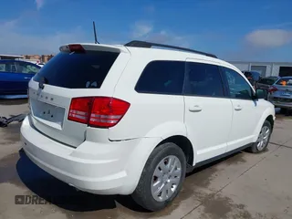 2019 Dodge Journey SE Value with VIN 3C4PDCAB1KT868065, listed as a IAAI auction lot 41642318 with 97,735 mi miles and . Bid and sale history available at DreamBid. Image 4.
