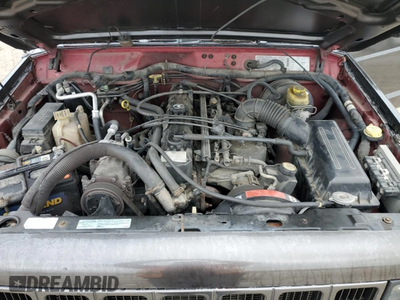 1999 Jeep Cherokee Sport with VIN 1J4FT68S2XL656679, listed as a Copart auction lot 88145875 with 254,038 mi miles and Salvage title. Bid and sale history available at DreamBid. Image 12.