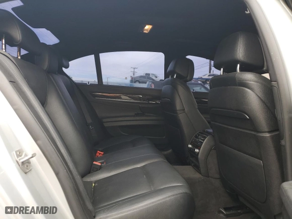 2015 BMW 7 Series 740i with VIN WBAYA6C59FD826757, listed as a Copart auction lot 41475055 with 140,665 mi miles and Salvage Title. Bid and sale history available at carsss.com. Image 10.