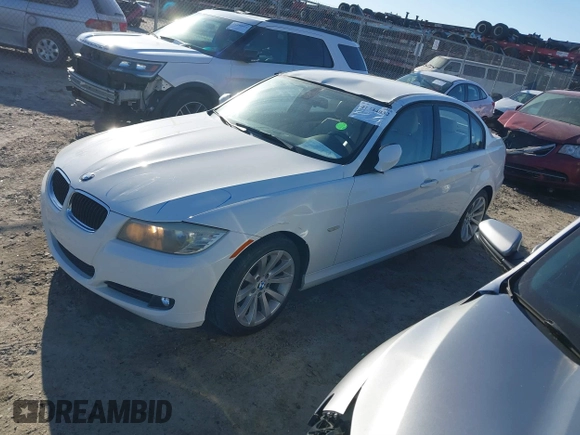 2011 BMW 3 Series 328i with VIN WBAPH7C57BE675578, listed as a IAAI auction lot 41844032 with 57,324 mi miles. Bid and sale history available at carsss.com. Image 2.