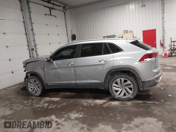2021 Volkswagen Atlas SE z VIN 1V2HE2CA9MC219076, wystawiony jako IAAI lot #41608670 z przebiegiem 56 162 mil mil oraz . Historia ofert i sprzedaży dostępna na DreamBid. Obrazek 13.