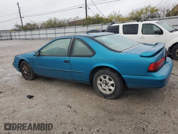 1994 Ford Thunderbird LX with VIN 1FALP6243RH223519, listed as a Copart auction lot 80962814 with 125,016 mi miles and Salvage Title. Bid and sale history available at DreamBid. Image 2.