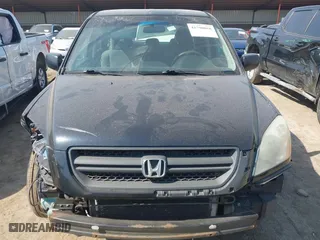 2005 Honda Pilot LX with VIN 2HKYF18135H540778, listed as a IAAI auction lot 41790068 with 203,191 mi miles. Bid and sale history available at carsss.com. Image 13.