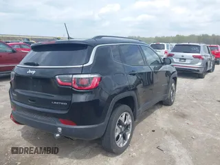 2018 Jeep Compass Limited with VIN 3C4NJDCB7JT332674, listed as a IAAI auction lot 42145567 with 111,852 mi miles and . Bid and sale history available at carsss.com. Image 4.