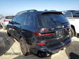 2024 BMW X7 M60i with VIN 5UX33EM04R9S50411, listed as a Copart auction lot 76962074 with 0 mi miles and Salvage Title. Bid and sale history available at carsss.com. Image 2.