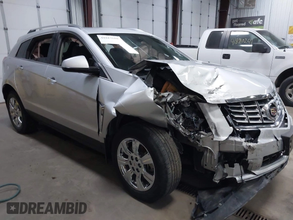 2014 Cadillac SRX Luxury Collection z VIN 3GYFNEE36ES679505, wystawiony jako IAAI lot #41817608 z przebiegiem 62 351 mil mil oraz . Historia ofert i sprzedaży dostępna na DreamBid. Obrazek 1.