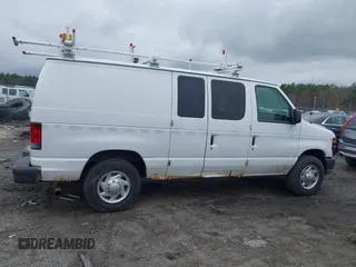2011 Ford Econoline Cargo Commercial z VIN 1FTNE2EL3BDA19868, wystawiony jako IAAI lot #41973985 z przebiegiem 128 980 mil mil oraz . Historia ofert i sprzedaży dostępna na DreamBid. Obrazek 13.
