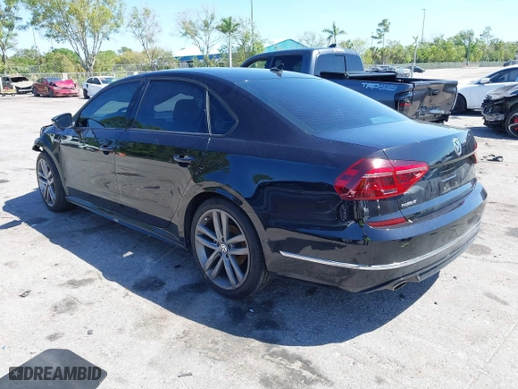 2018 Volkswagen Passat 2.0T S with VIN 1VWAA7A33JC009677, listed as a IAAI auction lot 41796723 with 63,151 mi miles. Bid and sale history available at carsss.com. Image 3.