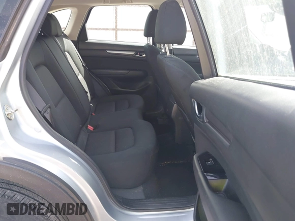 2019 Mazda CX-5 Sport with VIN JM3KFBBM6K1582760, listed as a IAAI auction lot 41822152 with 60,620 mi miles and . Bid and sale history available at DreamBid. Image 8.