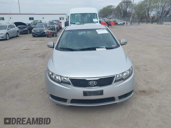 2012 Kia Forte EX with VIN KNAFU4A25C5591601, listed as a IAAI auction lot 42071351 with 120,636 mi miles. Bid and sale history available at carsss.com. Image 12.