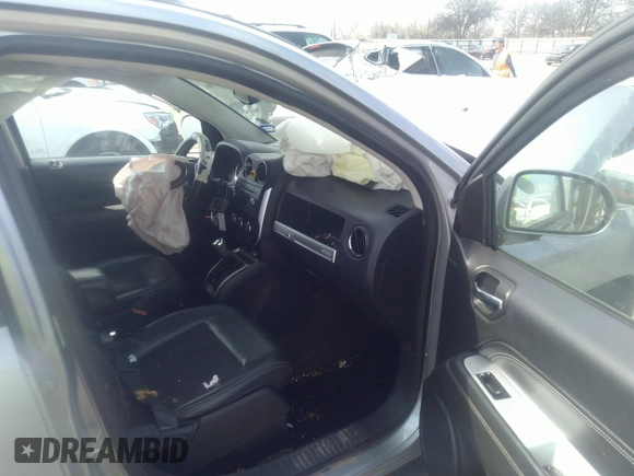 2016 Jeep Compass Latitude with VIN 1C4NJDEBXGD594149, listed as a IAAI auction lot 41523706 with 113,200 mi miles. Bid and sale history available at carsss.com. Image 5.