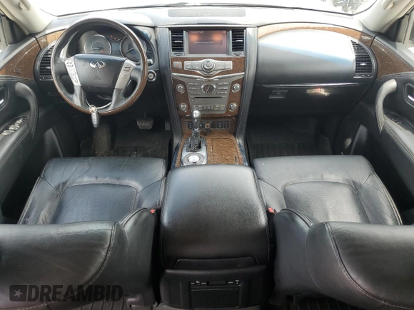 2016 Infiniti QX80 with VIN JN8AZ2NF5G9610490, listed as a Copart auction lot 60041325 with 131,253 mi miles and Salvage title. Bid and sale history available at DreamBid. Image 8.