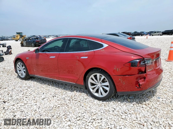 2014 Tesla Model S 60 with VIN 5YJSA1H18EFP38582, listed as a Copart auction lot 56581735 with 69,106 mi miles and Salvage title. Bid and sale history available at DreamBid. Image 2.
